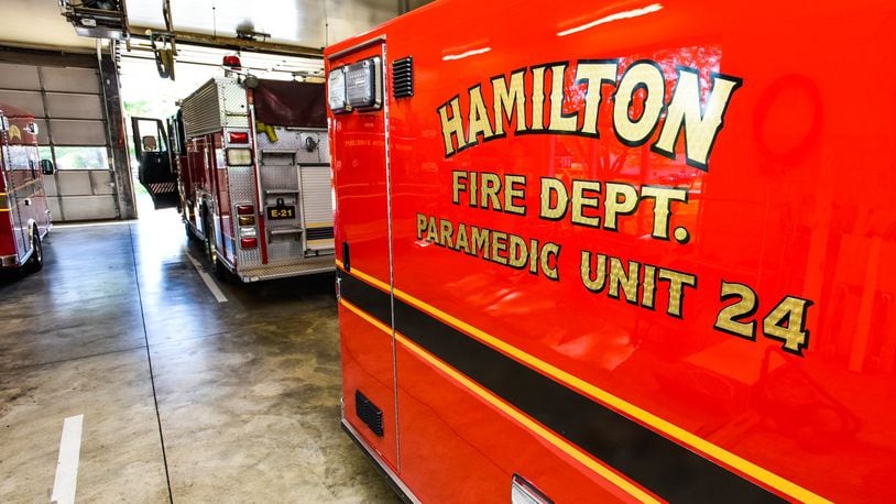 A Hamilton fire ambulance awaits its next run. The city’s fire chief says the number of emergency medical runs has been up recently because of heat-related illnesses. NICK GRAHAM/STAFF