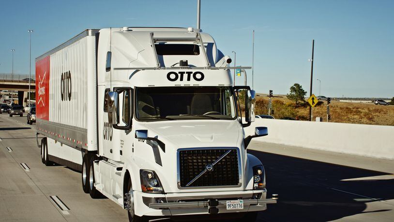This October 2016 photo provided by Anheuser-Busch shows a self-driving truck that delivers beer, in Colorado. Anheuser-Busch said it completed the world's first commercial shipment by self-driving truck, sending a beer-filled tractor-trailer on a journey of more than 120 miles through Colorado. (Kyle Bullington/Otto/Anheuser-Busch via AP)