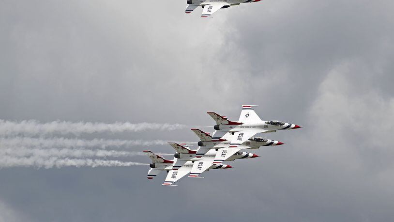 Thunderbird 7, top, acts as chase plane for the echelon formation. The U.S. Air Force Thunderbirds arrived at the Dayton International Airport on Monday in preparation for the upcoming Vectren Dayton Air Show. TY GREENLEES / STAFF