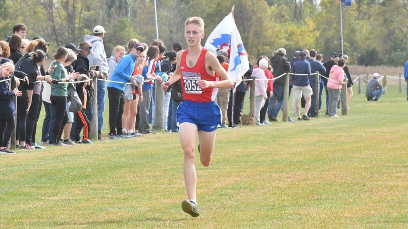 Carroll junior Kevin Agnew followed up his Division II district cross country championship at Cedarville with a victory in the regional tournament at Troy. Greg Billing / Contributed