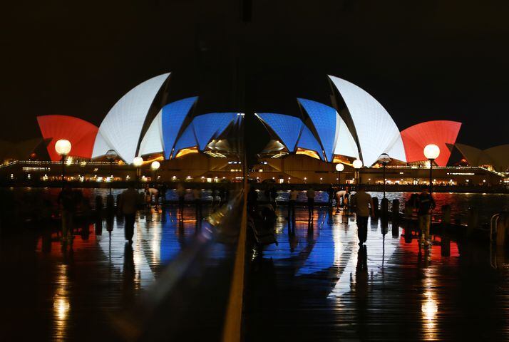 The Sydney Opera House illuminates sails in French colors