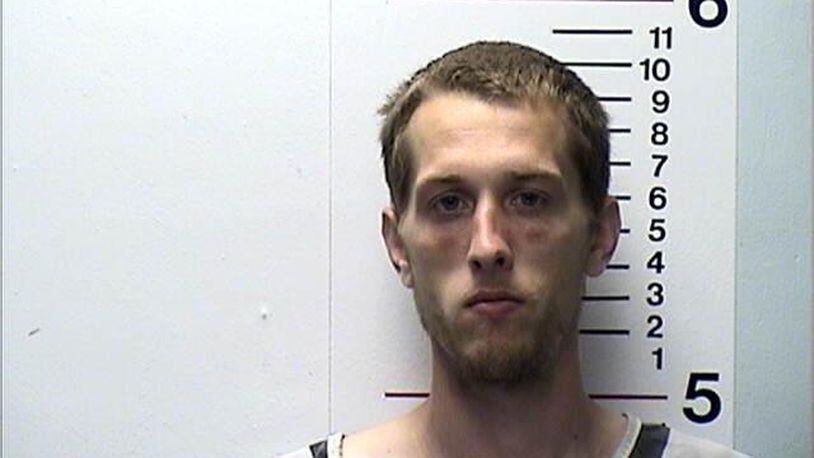 Justin Mills was charged with cruelty after he allegedly hit two dogs.