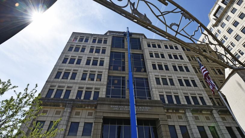 With several floors of Hamilton's city government tower occupied by companies, some city government offices - economic development and finance - recently moved out, and eventually may move elsewhere. STAFF FILE PHOTO