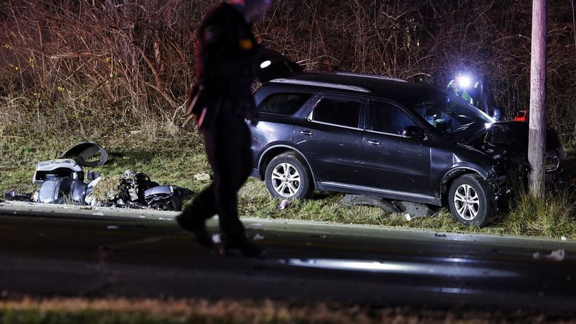 A motorcycle and SUV were involved in a crash Friday evening, Dec. 8, 2023, on state Route 122 at West Alexandria Road in Madison Twp. in Butler County. NICK GRAHAM/STAFF