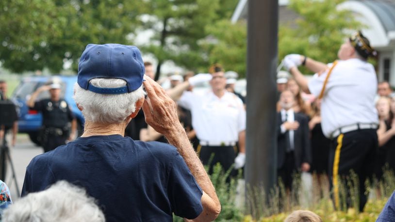 Veterans and first responders salute as members of VFW Post 7696 raise the American flag over Chesterwood Village during its Wednesday, September 11, 2019 Patriot Day remembrance ceremony. CONTRIBUTED