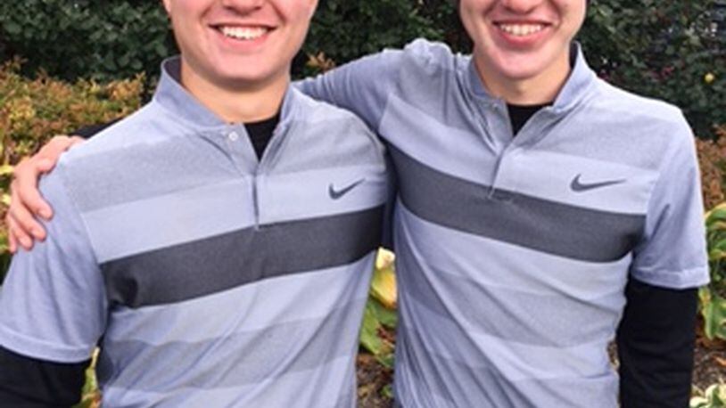 Lakota East’s golfing brothers, Will Schmidt (left) and Kyle Schmidt, pose for a photo at the Division I state boys golf tournament in Columbus on Saturday. CONTRIBUTED PHOTO BY DOUG HARRIS
