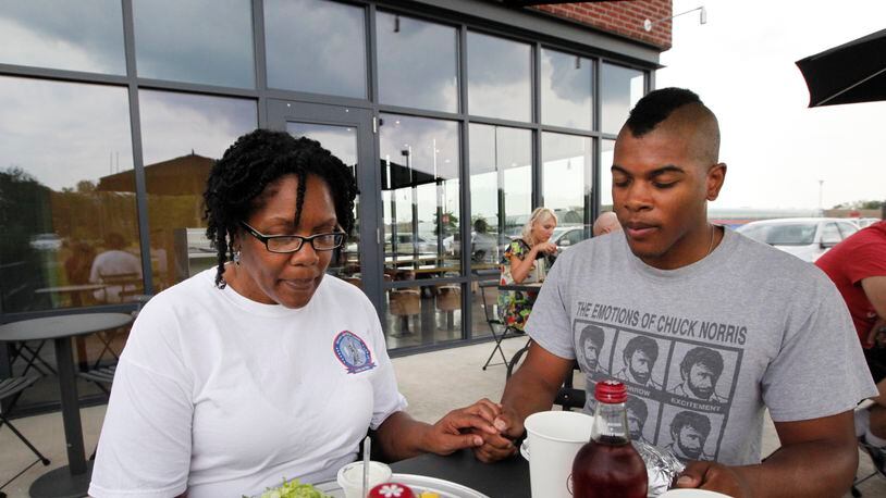 After his return from Afghanistan, Army National Guard Spc. Seth Parker and his mother, Pamela Brown-Parker, share lunch at one of Seth’s favorite restaurants, Chipotle.