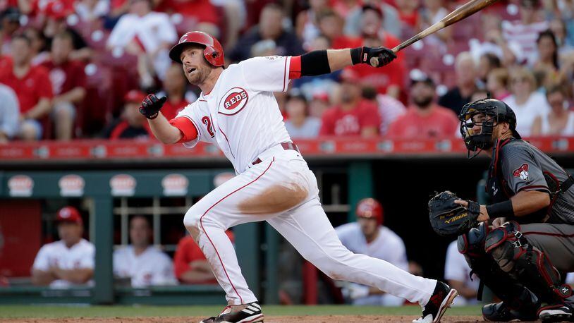 Reds shortstop Zack Cozart watches a home run leave Great American Ball Park against the Diamondbacks on July 19.