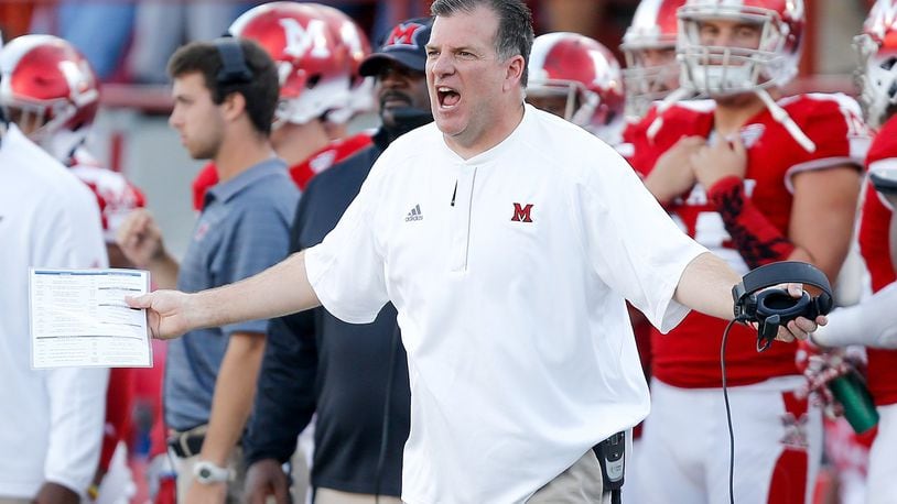 Miami University coach Chuck Marti reacts during a game against Buffalo at Yager Stadium in Oxford on Oct. 21, 2017. MICHAEL REAVES/GETTY IMAGES