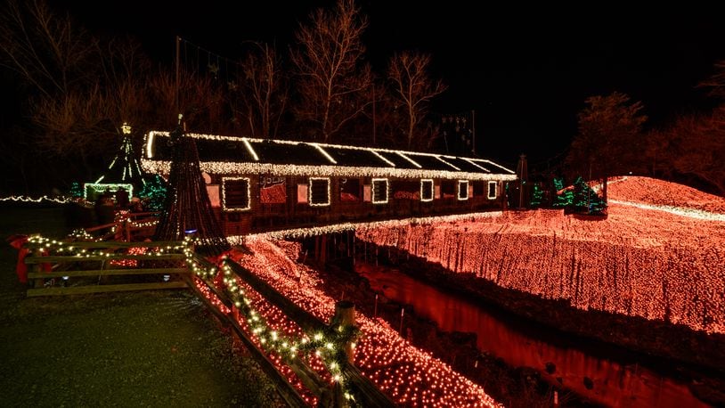 The historic Clifton mill, built in 1802 and still working, opened its Legendary Lights for the 2019 holiday season on Friday, Nov. 29. Four million lights cover Clifton Mill’s scenic attributes, including the mill, a covered bridge, cliffs and riverbanks. Last December, Clifton Mill was the winner of a $50,000 prize on ABC show “The Great Christmas Light Fight.” TOM GILLIAM / CONTRIBUTING PHOTOGRAPHER