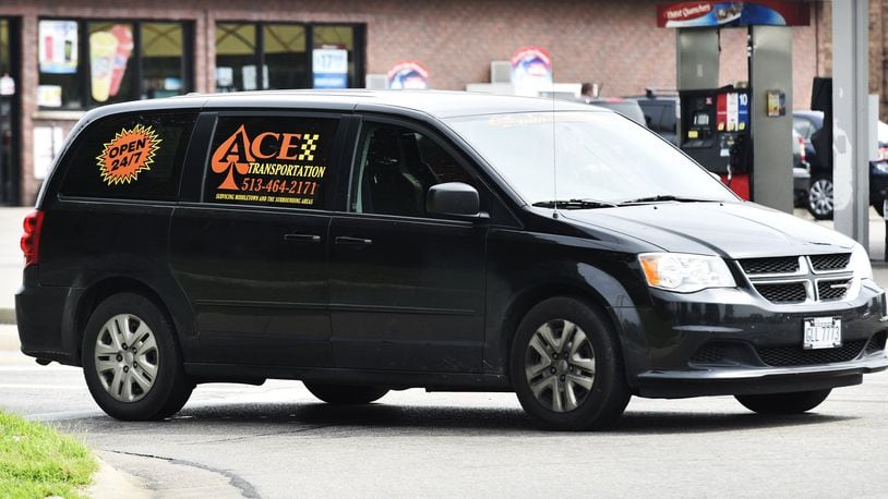 A vehicle from Ace 1 Transportation heads to pick up a client on Jackson Lane Thursday, July 20 in Middletown. NICK GRAHAM/STAFF