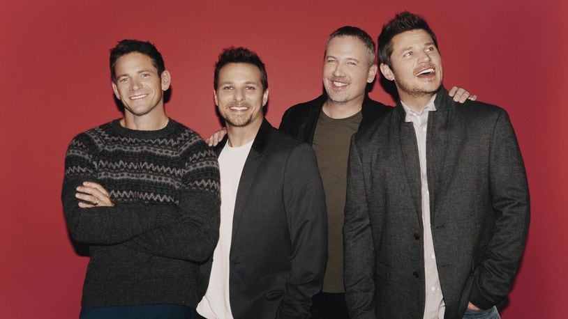 98 Degrees — brothers Nick Lachey and Drew Lachey, Justin Jeffre and Jeff Timmons — are coming to Cincinnati’s Aronoff Center on Saturday, Nov. 24. CONTRIBUTED/ELIAS TAHAN
