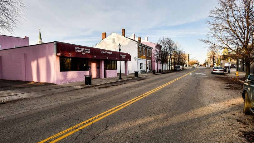 Miami University students will create an economic-development for Hamilton’s impoverished Second Ward, where residents have urged the city for help fostering businesses in their neighborhood. Here, usinesses line South Second Street in Hamilton. NICK GRAHAM/STAFF