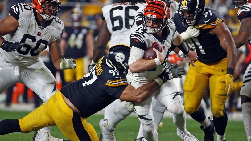 PITTSBURGH, PA - SEPTEMBER 30: Cameron Heyward #97 of the Pittsburgh Steelers sacks Andy Dalton #14 of the Cincinnati Bengals in the third quarter on September 30, 2019 at Heinz Field in Pittsburgh, Pennsylvania. (Photo by Justin K. Aller/Getty Images)