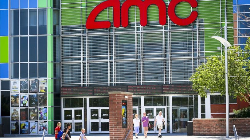 Movie goers leave the AMC West Chester 18 movie theater after an afternoon showing, Friday, July 24, 2015. GREG LYNCH / STAFF