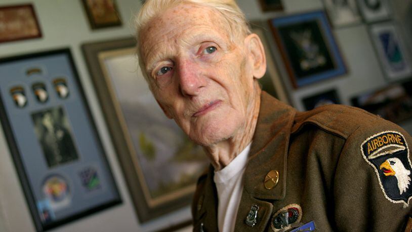 Jim Martin was a member of the 101st Airborne Division on D Day. He and his group jumped 25 miles behind enemy lines the night before the invasion under heavy German artillery fire. He also saw action in Holland, the Battle of the Bulge, and Germany, liberating a concentration camp and Hitler’s Bavarian home. He was awarded two Purple Hearts and a Bronze Star. STAFF PHOTO BY BILL REINKE.