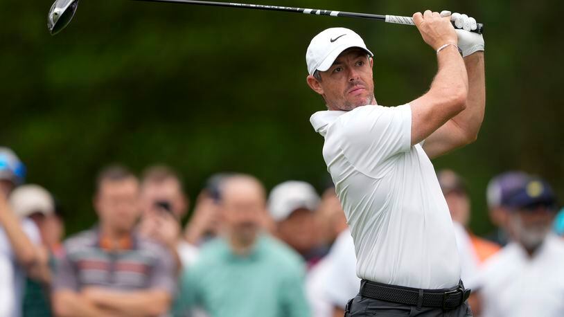 Rory McIlroy, of Northern Ireland, watches his tee shot on the third hole first round of the Wells Fargo Championship golf tournament at the Quail Hollow Club Thursday, May 9, 2024, in Charlotte, N.C. (AP Photo/Chris Carlson)