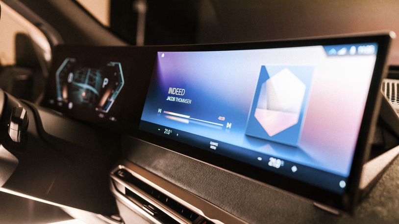 This photo provided by BMW shows the next-generation iDrive operating system and infotainment screen. BMW has removed this popular feature from several models. (BMW of North America via AP)