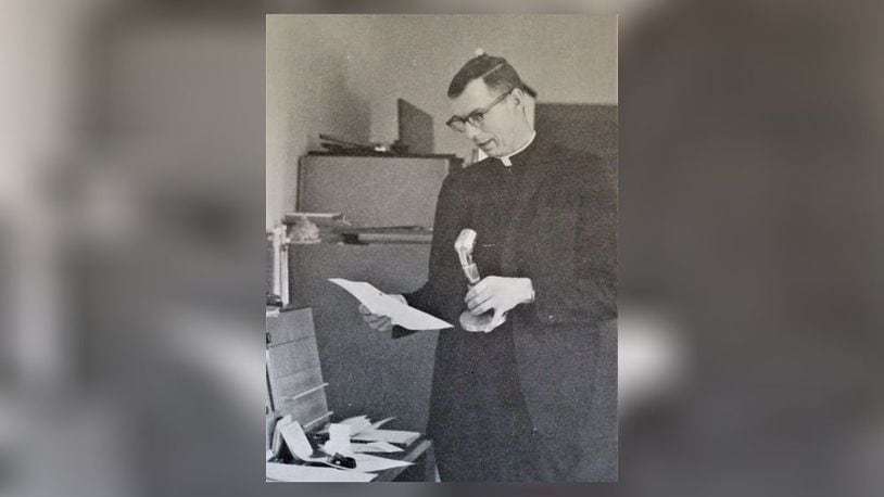 Former Fenwick High School Principal James J. O’Connor’s legacy of leading the Middletown high school during its boom years of the late 1960s and early 1970s helped lead to the school’s modern-day success. The Rev. O’Connor, who died May 4 at the St. Charles Center in Celina, Ohio, was instrumental in shepherding the Catholic Middletown school through some of its most transformational years, said Fenwick school officials. O'Connor pictured here in undated photo from the late 1960s making an announcement to Fenwick's students and staff. CONTRIBUTED