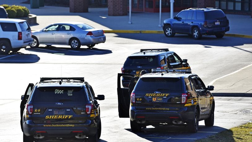 Butler County Sheriff’s Office deputies outside Madison Jr./Sr. High School after a shooting there Feb. 29. NICK GRAHAM/STAFF