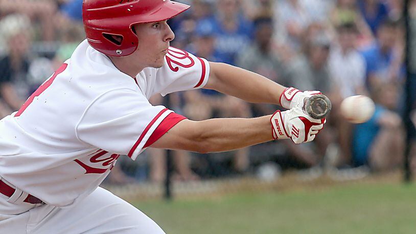 Lakota West’s A.J. Petersen attempts to bunt during a Division I district final against Springboro at Centerville last Saturday. CONTRIBUTED PHOTO BY E.L. HUBBARD
