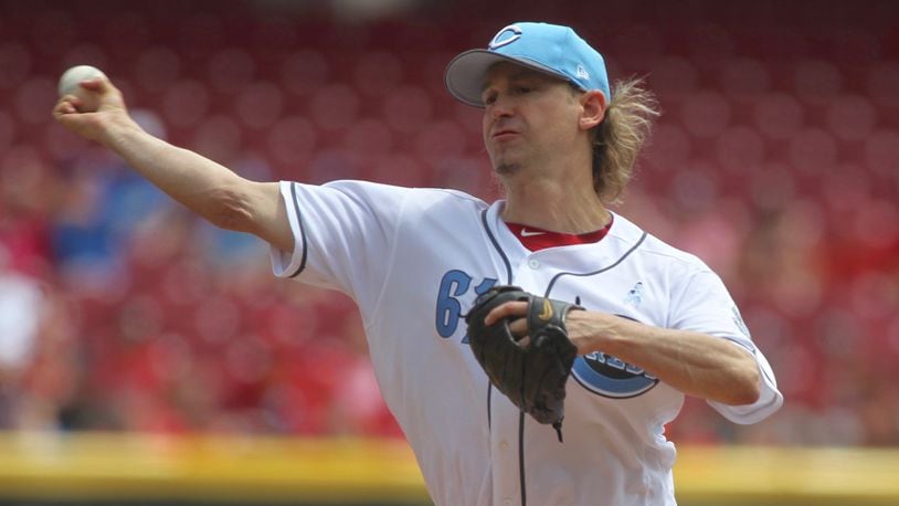 Reds pitcher Bronson Arroyo, an accomplished musician, will perform a postgame concert as the team pays tribute to his 16-year career Sept. 23. Arroyo is retiring after this season. DAVID JABLONSKI / STAFF