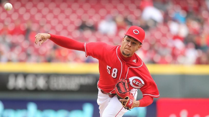 Reds starter Luis Castillo pitches against the Nationals on Saturday, March 31, 2018, at Great American Ball Park in Cincinnati. David Jablonski/Staff