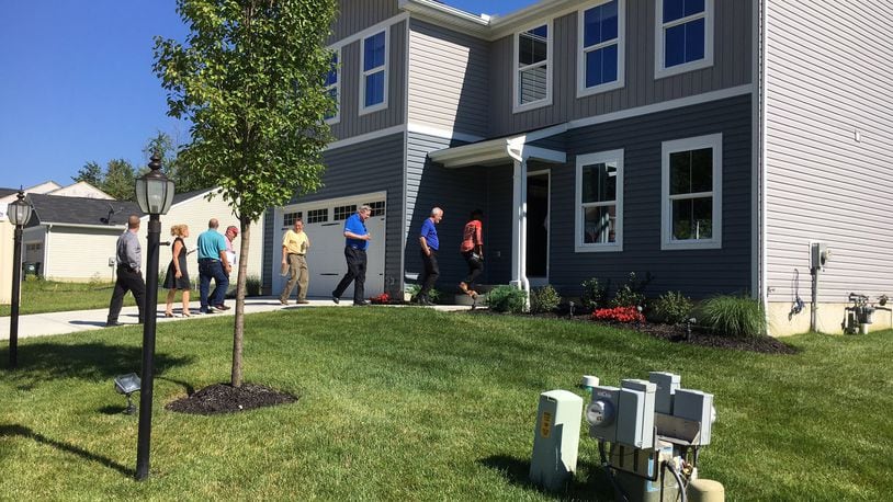 Members of Middletown City Council, the Planning Commission along with city officials toured a five-bedroom home in Amelia in July 2017 that was developed by Ryan Homes. The home builder is interested in building new homes in the $150,000 to $220,000 in the Sawyer Mill area of Middletown. ED RICHTER/STAFF