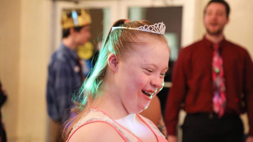 Lillian Mumphrey is all smiles after being crowned queen during a formal dance for students with special needs.