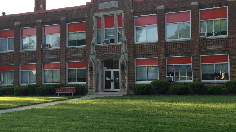 The Carlisle Board of Education on Monday approved the first of two steps to place a nearly $49 million bond issue to build a new school building. Chamberlain Middle School, which was built in 1930, would be one of four buildings that would be demolished and replaced with a new K-12 building. ED RICHTER/STAFF