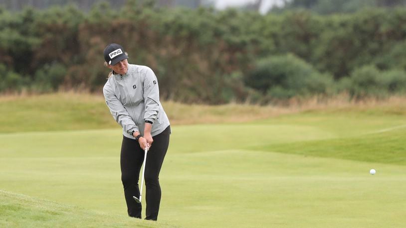 United States' Marissa Steen chips onto the 14th green during the third round of the Women's British Open golf championship, in Carnoustie, Scotland, Saturday, Aug. 21, 2021. (AP Photo/Scott Heppell)