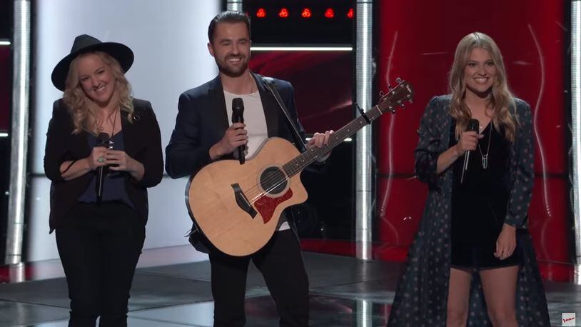 Wyoming, Ohio natives Megan, 31, Ryan, 25, and Katey, 28, make up the sibling trio The Bundys that were selected to be on The Voice on NBC. Pictured is the group during the Feb. 26 airing of the blind auditions of The Voice when they were chosen to be on the show. PHOTO COURTESY OF NBC/THE VOICE