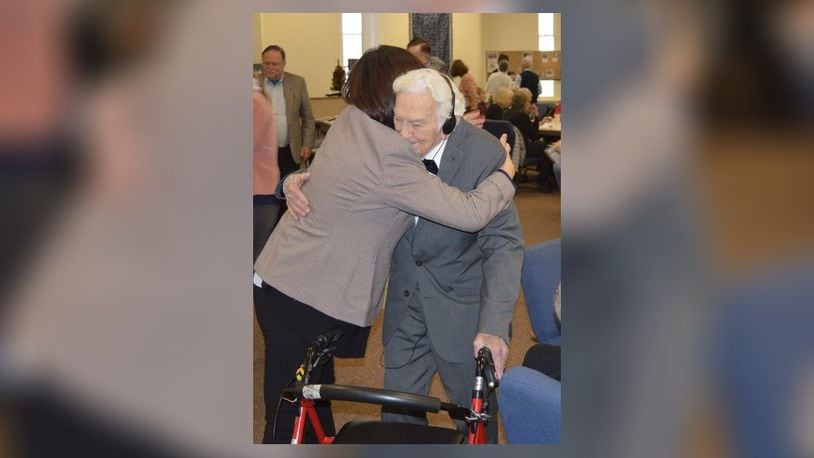 Hugs and best wishes abounded Jan. 6, 2019 at a celebration of the 100th birthday of John Blocher held in the Community Room of the Oxford United Methodist Church. CONTRIBUTED/BOB RATTERMAN