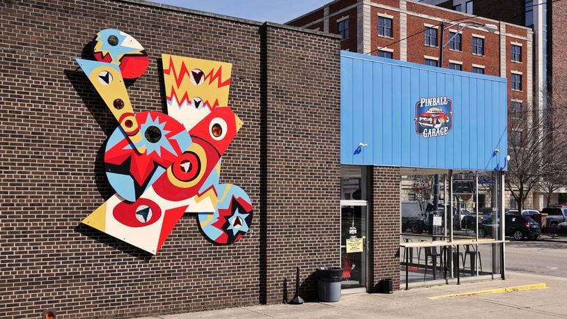 A community art project mural was created with the help of Inspiration Studios with the final project being installed at Pinball Garage in Hamilton. NICK GRAHAM/STAFF