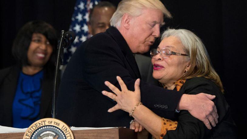 WASHINGTON, DC - FEBRUARY 21:  (AFP OUT) President Donald Trump hugs Alveda King, niece of Martin Luther King Jr., as he delivers remarks after touring the Smithsonian National Museum of African American History & Culture on February 21, 2017 in Washington, DC. (Photo by Kevin Dietsch - Pool/Getty Images)