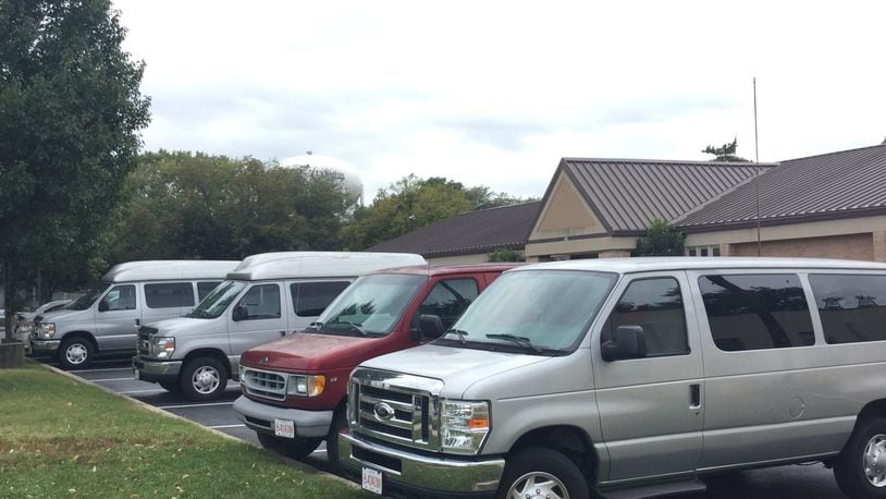 Pictured are some of the Warren County Board of Developmental Disabilities vans that were repaired for free by Safelite AutoGlass. The windshields of the vans had been smashed out by vandals. CONTRIBUTED