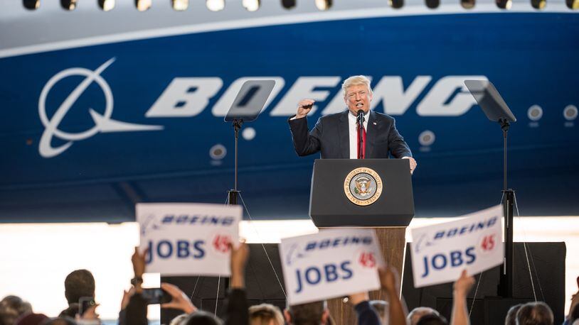 NORTH CHARLESTON, SC - FEBRUARY 17: U.S. President Donald Trump addresses a crowd during the debut event for the Dreamliner 787-10 at Boeing's South Carolina facilities on February 17, 2017 in North Charleston, South Carolina. (Photo by Sean Rayford/Getty Images)