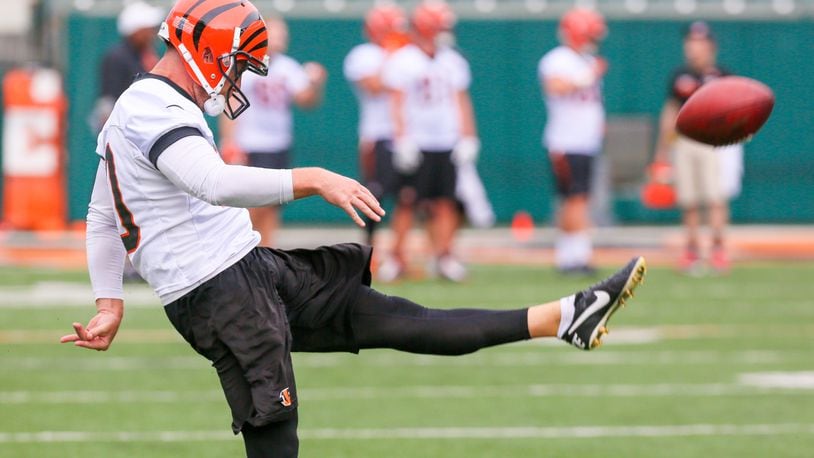 Bengals punter Kevin Huber (10) participates in a team practice at Paul Brown Stadium, Tuesday, June 13, 2017. GREG LYNCH / STAFF