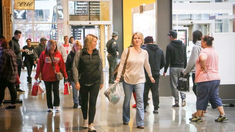 Shoppers walk through the Foundry at Liberty Center as they shop on Black Friday, Nov. 25, 2016. GREG LYNCH /  STAFF