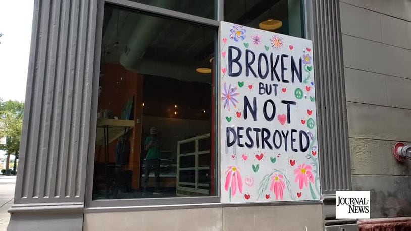 Almond Sisters Bakery sees large community support after a window was broken over the weekend.