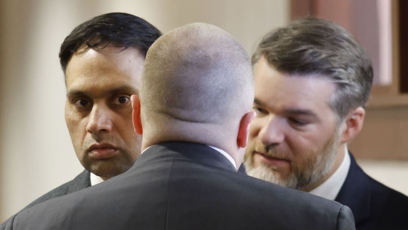 Gurpreet Singh, left, with his attorneys Wednesday during this death penalty trial in Butler County Common Pleas Court. NICK GRAHAM/STAFF