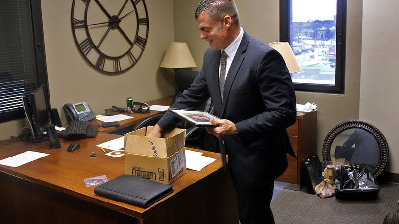 Andy Wilson packs up his office at the Clark County Prosecutor’s Office Thursday. Eric Higgenbotham/Staff