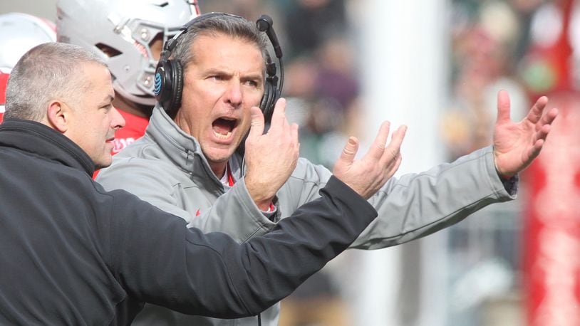 Ohio State’s Urban Meyer shouts to his players during a game against Michigan State on Saturday, Nov. 11, 2017, at Ohio Stadium in Columbus. David Jablonski/Staff