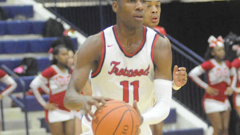 Trotwood-Madison sophomore Carl Blanton had 17 points in an 84-74 defeat of Cin. Hughes in a D-II regional final at Trent Arena on Saturday. MARC PENDLETON / STAFF