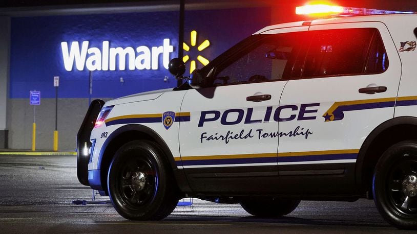 Police investigate a fatal shooting at Walmart on Princeton Road in Fairfield Township Thursday, May 26, 2022. NICK GRAHAM/STAFF