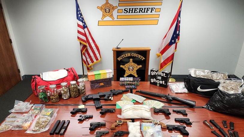 An extensive drug trafficking investigation resulted in the arrest of a Hamilton man and the seizure of drugs, guns and cash, according to the Butler County Sheriff’s Office.