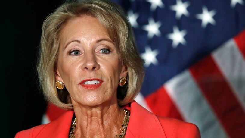 Education Secretary Betsy DeVos speaks about campus sexual assault and enforcement of Title IX, the federal law that bars discrimination in education on the basis of gender, Thursday, Sept. 7, 2017, at George Mason University Arlington, Va., campus. (AP Photo/Jacquelyn Martin)