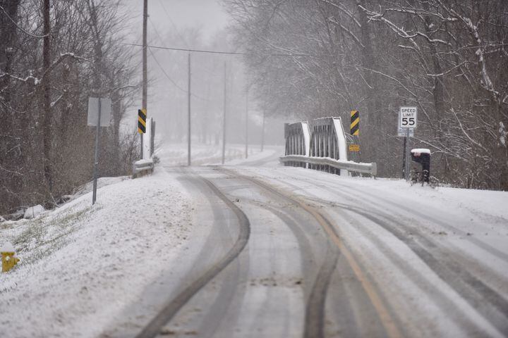 PHOTOS: Snowstorm covers region Saturday