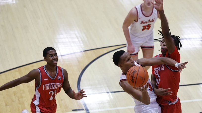 Fairfield's Kollin Tolbert goes to the hoop defended by Lakota West's Jason Lavender during their basketball game Friday, Jan. 14, 2022 at Fairfield High School. NICK GRAHAM / STAFF