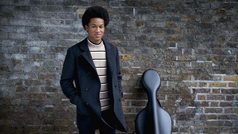 In this undated handout supplied by Kensington Palace, cellist Sheku Kanneh-Mason, who performed Saturday, May 19, 2018, at the wedding of Prince Harry and Meghan Markle, poses for a photograph.